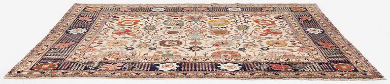 A semi-antique Tabriz carpet, Northwest Persia, of Safavid 'Vase' design, c.328 x 242 cm.
