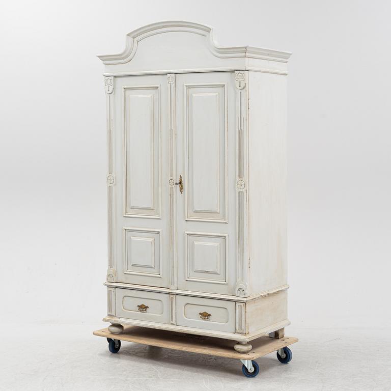 An Art Nouveau clothes cabinet, around 1900.