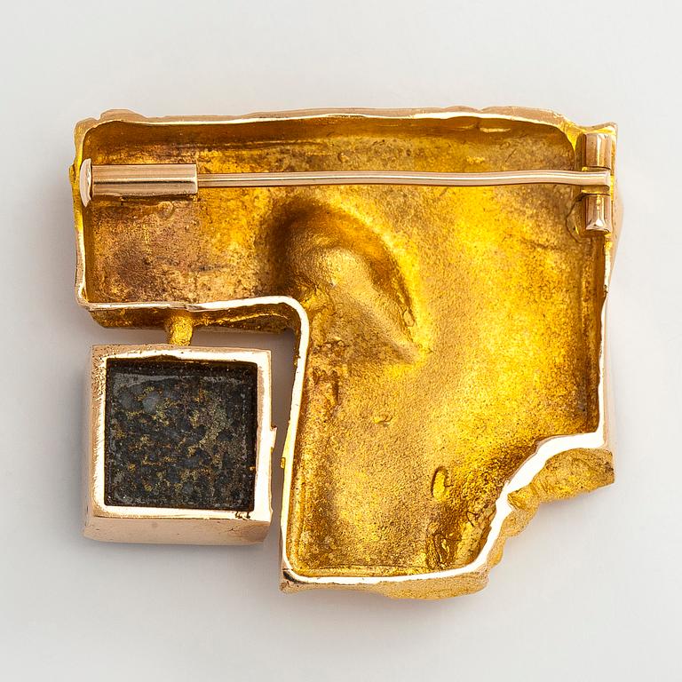 Björn Weckström, a 14K gold brooch with copper ore. Lapponia 1967.