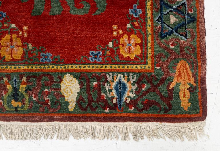 A Nepalese rug, c. 157 x 91cm.