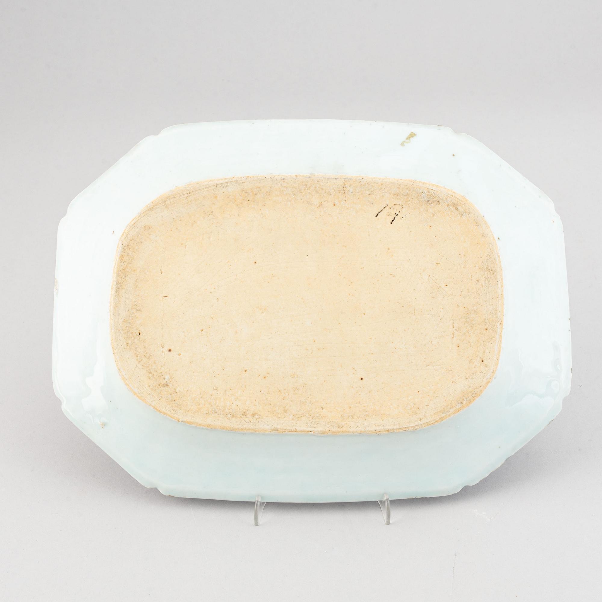 A set of two blue and white serving dishes, and two famille rose dinner plates, Qing dynasty, Qianlong (1736-95).