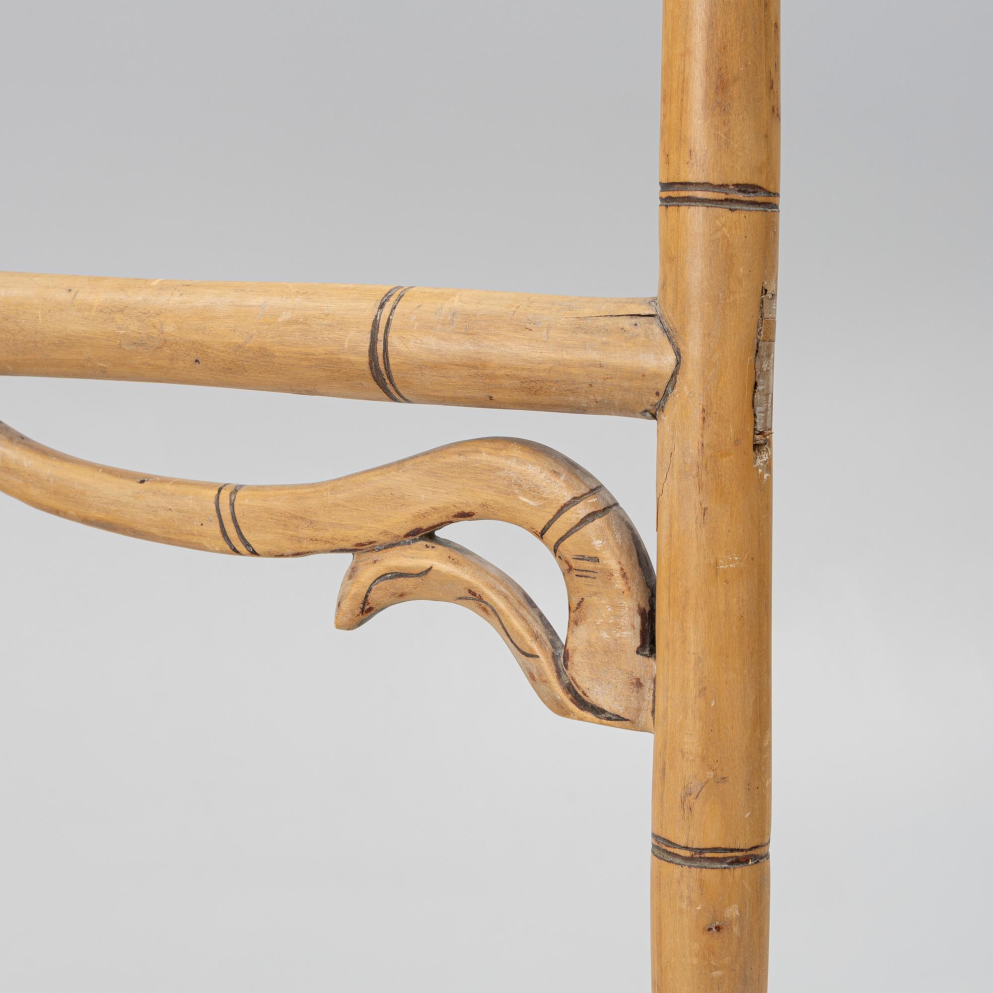 A Chinese bamboo and hardwood clothes rack, 20th century.