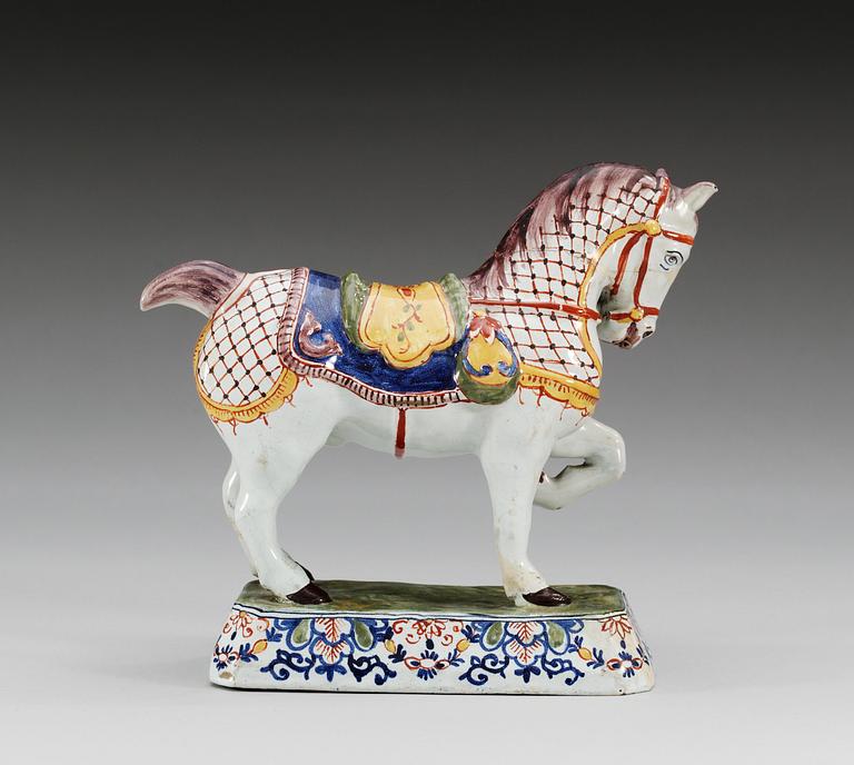 A Delft faience figure of a horse by Jacobus Adraensz Halder, end of 18th Century.