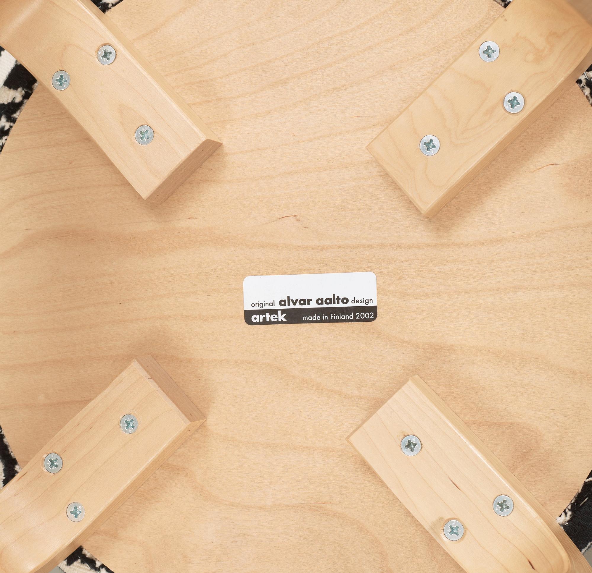 A pair of Alvar Aalto stools for Artek, Finland 2002.