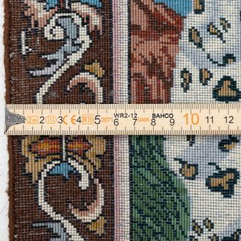 An oriental, figural rug, c. 64 x 50 cm.