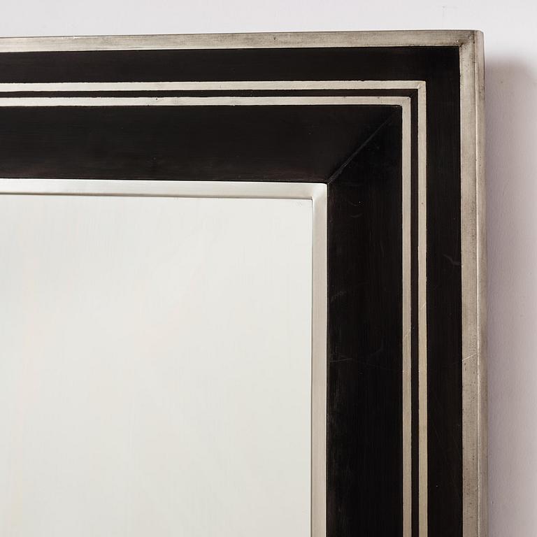 Uno Åhrén, attributed to, a rare ebonized pear wood and pewter mirror model "A 1154", Firma Svenskt Tenn, early 1930s.