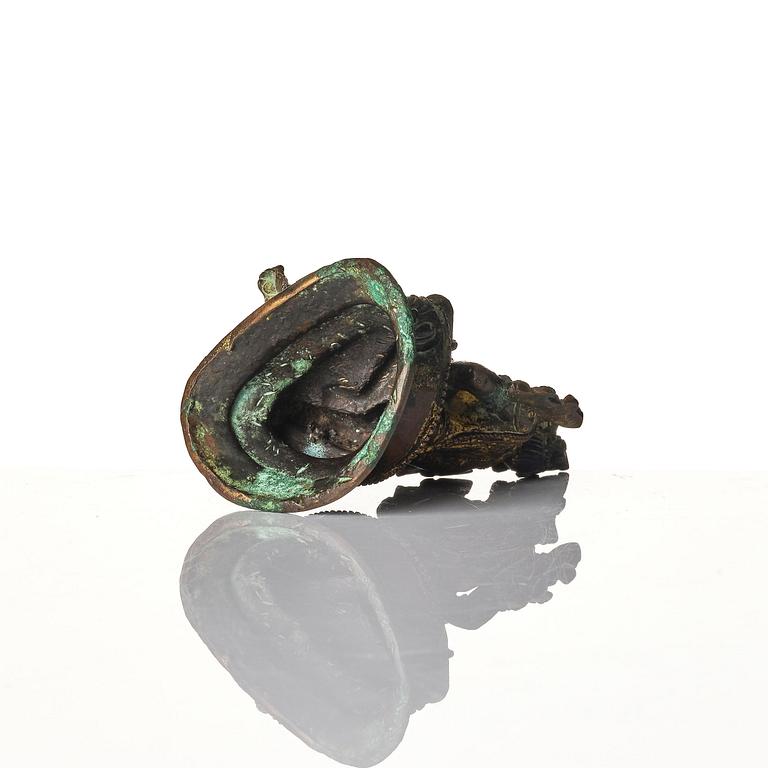 A copper alloy figure of Green Tara, Tibet, 17/18th century or later.