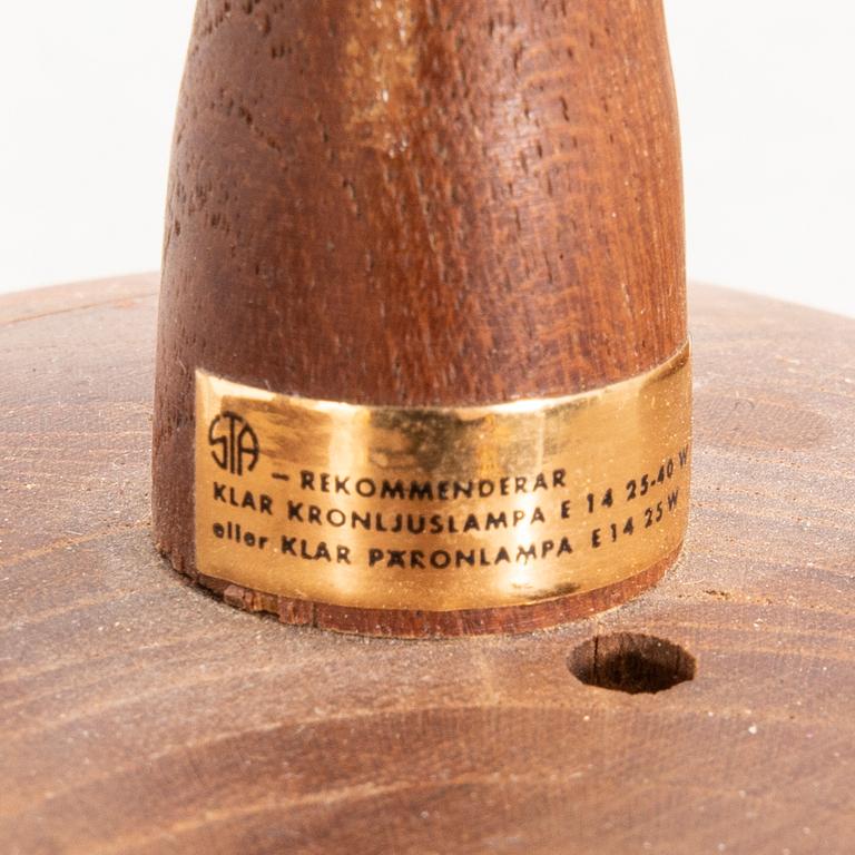 A 1960s teak ceiling pendant from Stilarmatur Tranås.