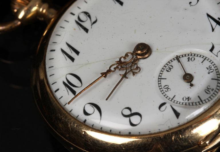 KLOCKA samt KLOCKKEDJA, guld, 14 k samt 18 k.