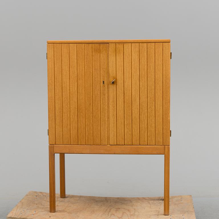 An oak drinks cabinet, 1960's.