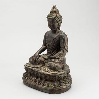 A bronze seated figure of Shakayamuni buddha, Mingtype.