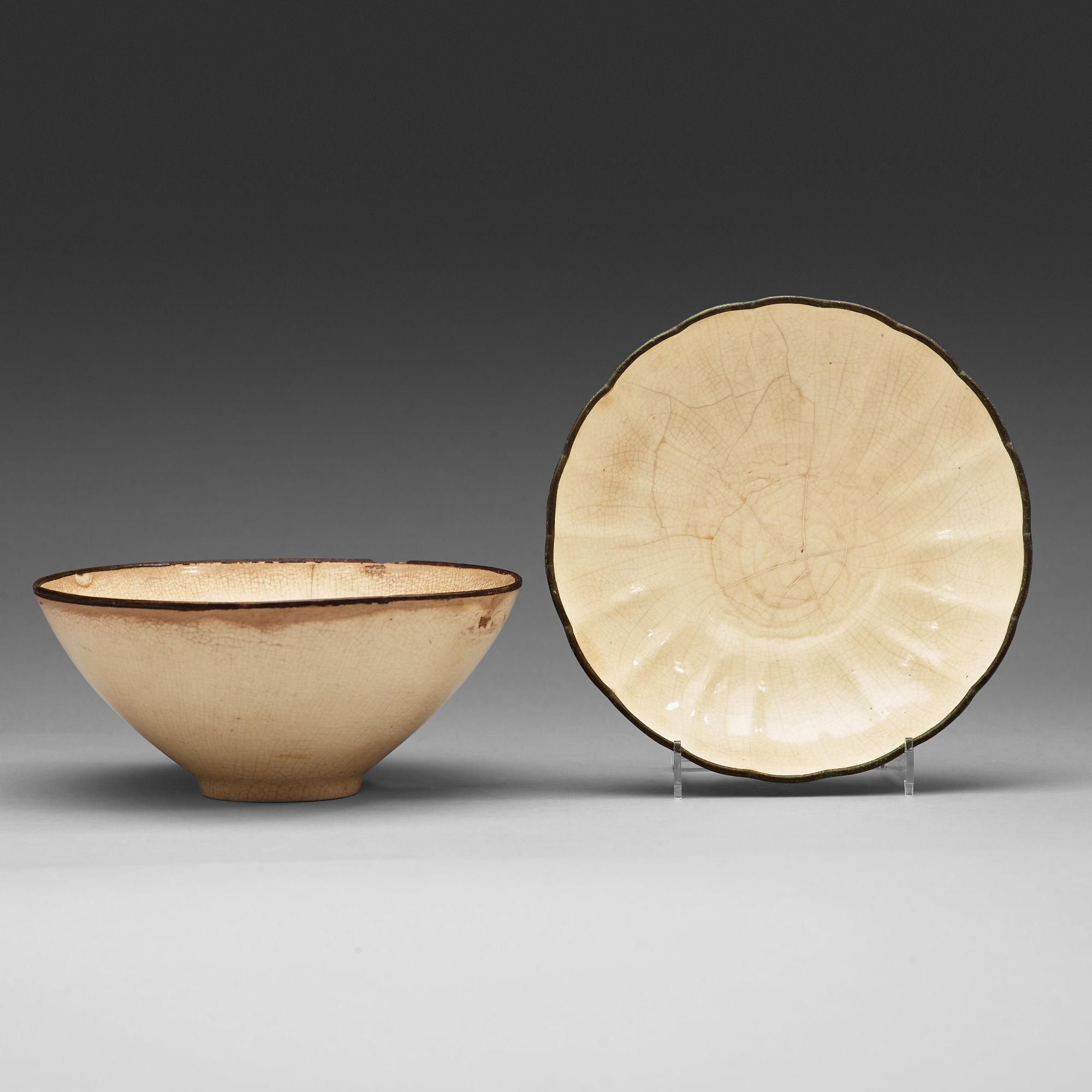 A creamglazed dish and a bowl, Ming dynasty (1368-1643).