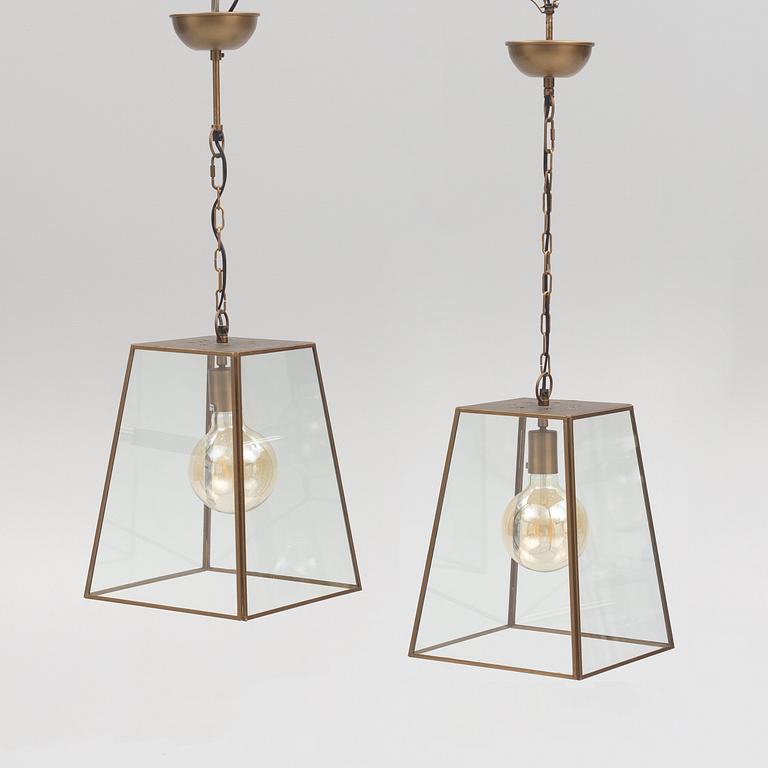 A pair of "Slim City" ceiling lamps from Artwood.