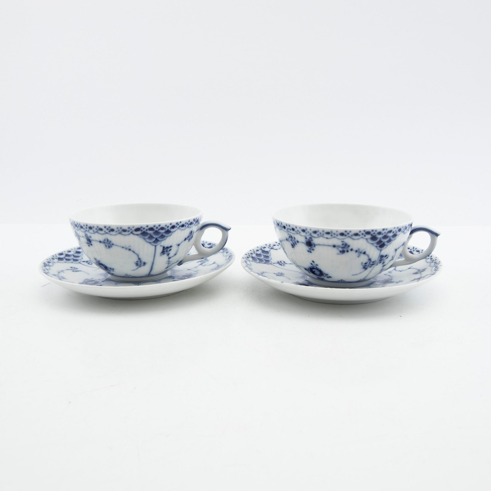 Royal Copenhagen, tea cups with saucers, a pair, porcelain, "Musselmalet", Denmark.