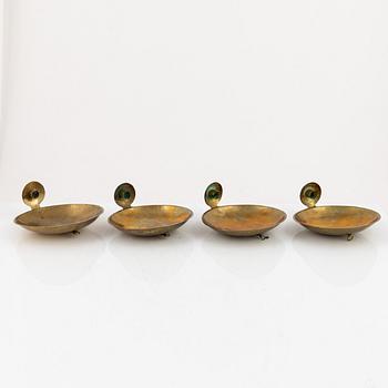 Karl-Erik Torssell, a set of four brass 'Kungalampetten' one-light reflector plates.