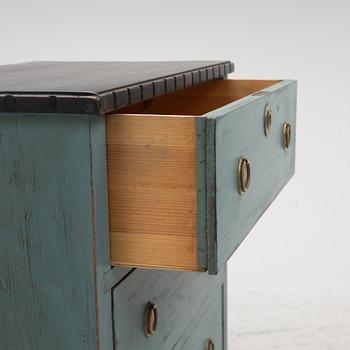 A chest of drawers, mid-20th Century.