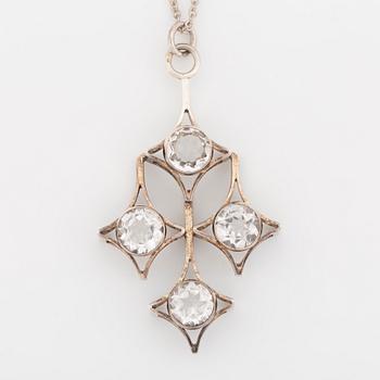 Kultasepät Salovaara, sterling silver bangle and pendant with rock crystal and syntehtic white spinel.