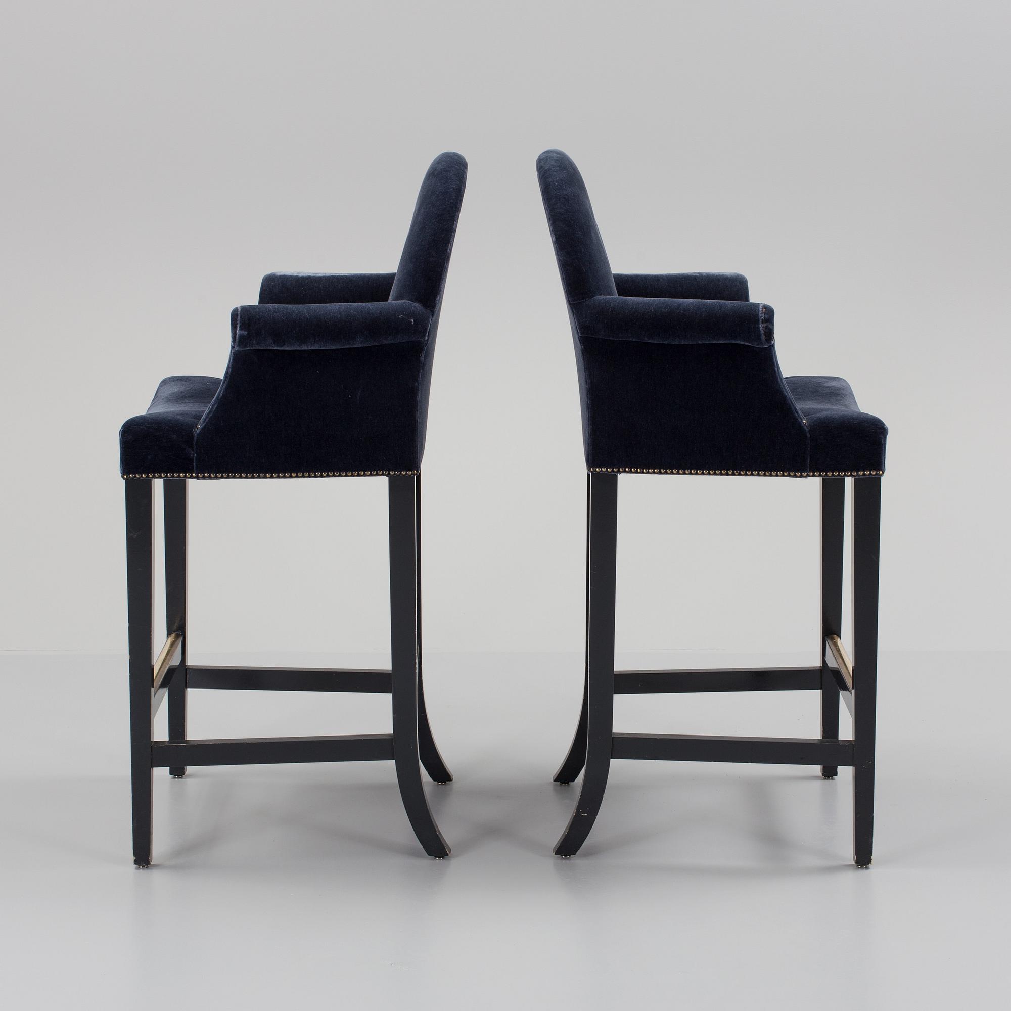 A pair of "The Simplified Moonback Counter Height Stool" barstools by Soane Britain.