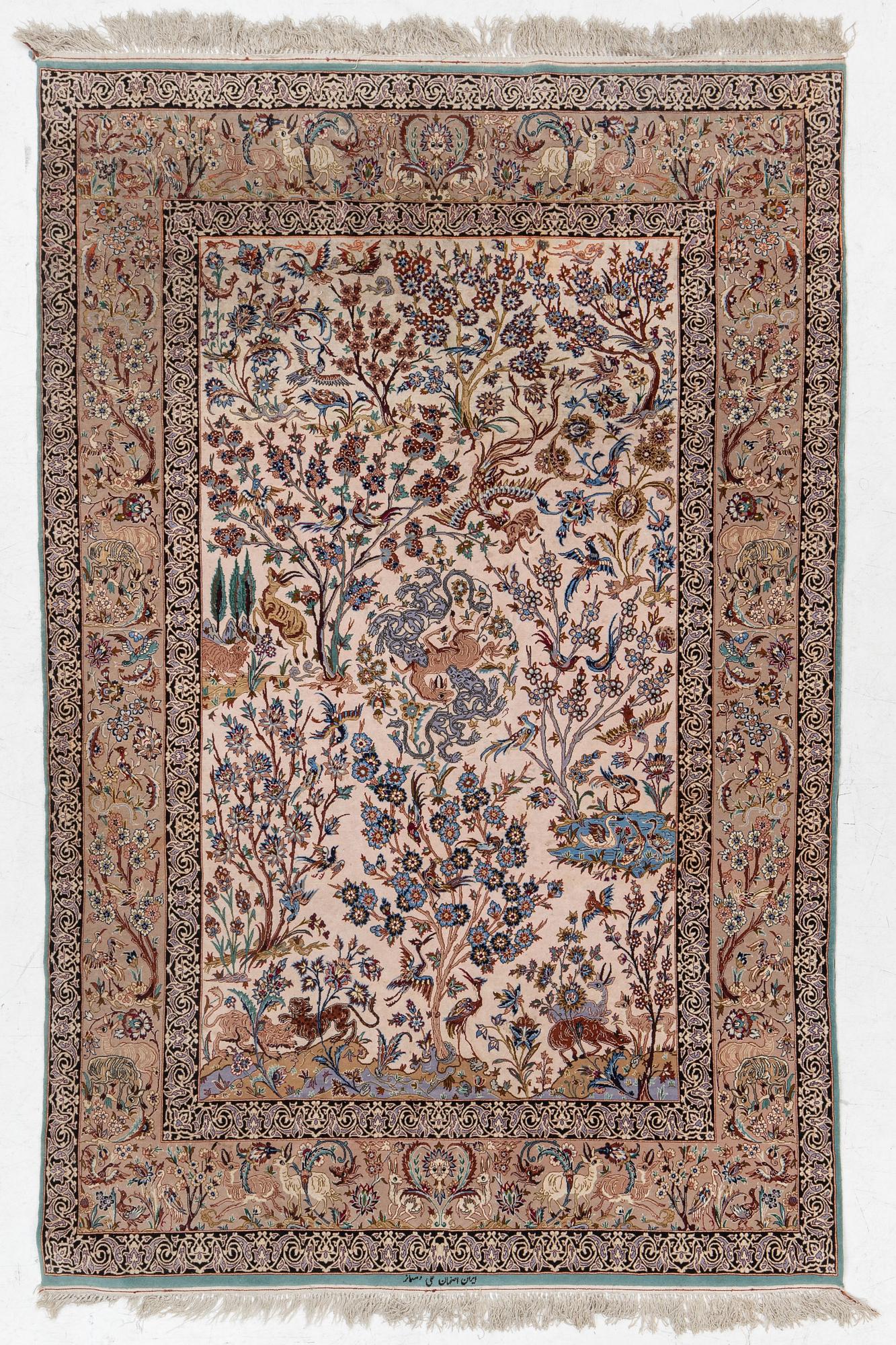 A signed pictoral Isfahan rug, Central Persia (Iran), signed, c. 235 x 154 cm.