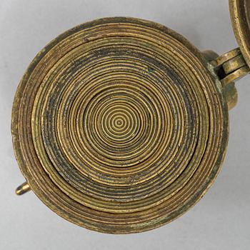 A brass weight set, late 19th century.