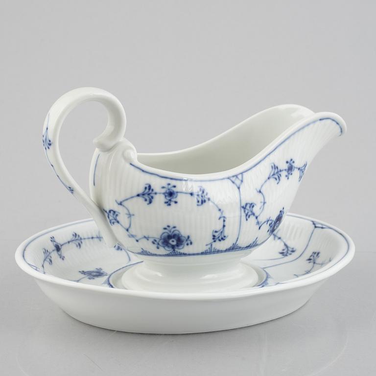 A 'Blue Fluted Plain' /'Musselmalet' sauce boat with stand, Royal Copenhagen, model 406 and 409, 1963 and 1893-1900.