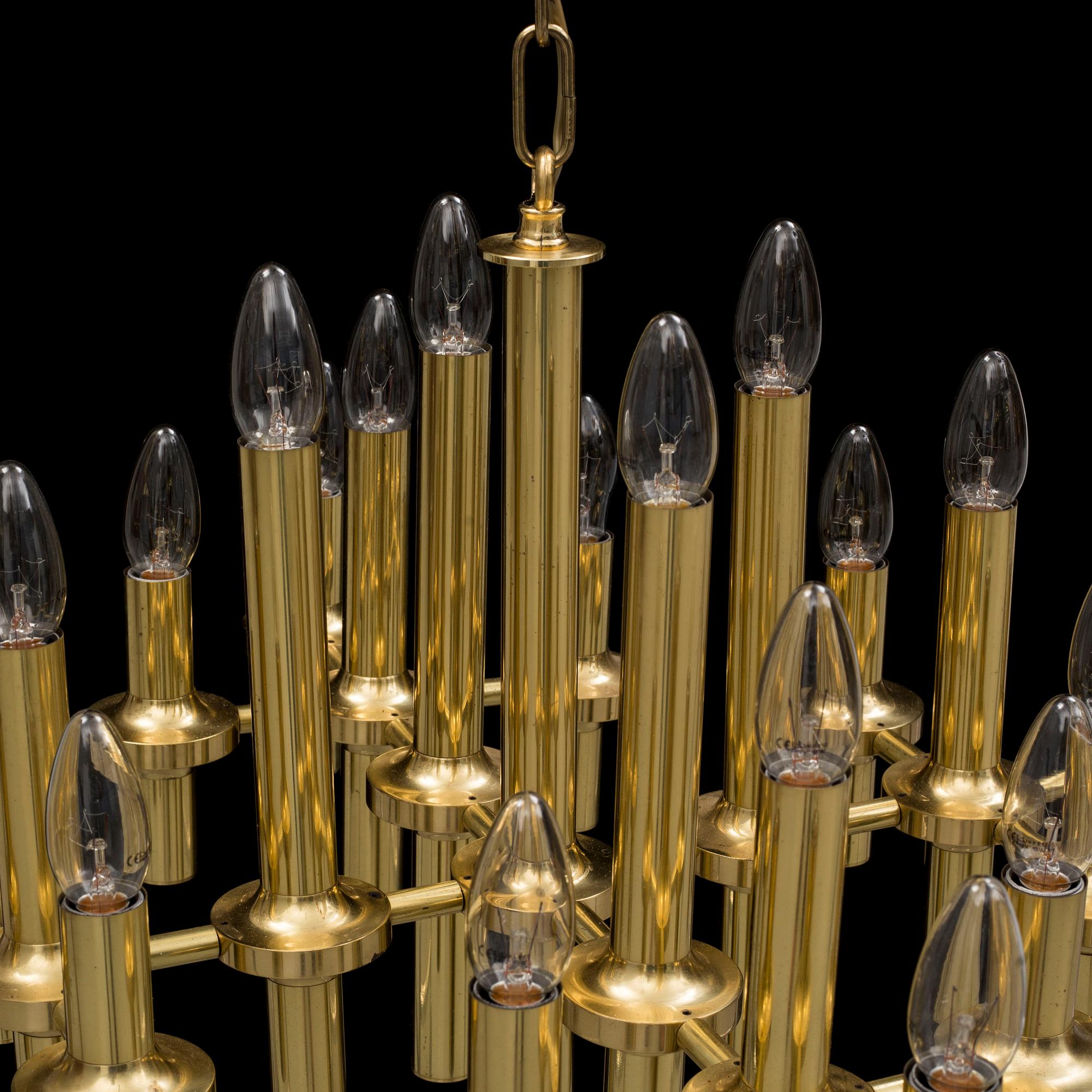 an italian brass ceiling light, possibly Gaetano Sciolaro, from the 1970's.