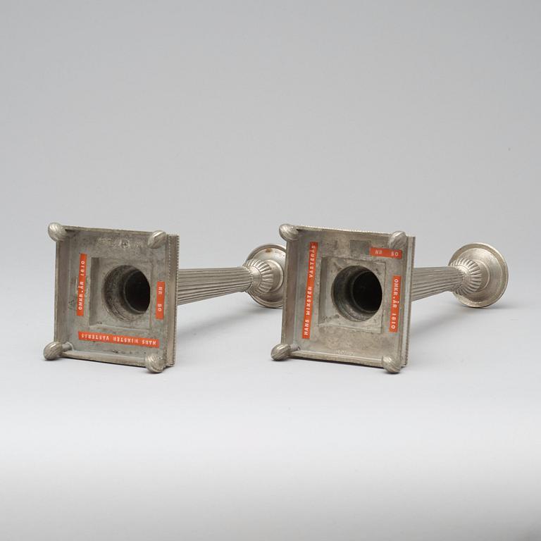 A pair of late Gustavian pewter candlesticks by H Wicksten, master 1782.