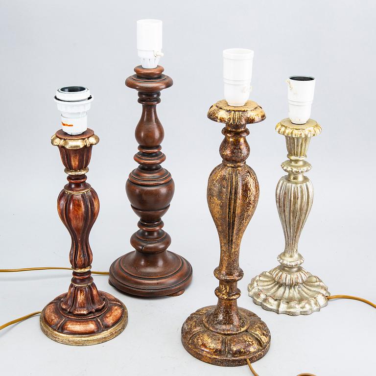 A set of four wood table lamps from Paoletti, Firenze Italy, second half of 20th century.