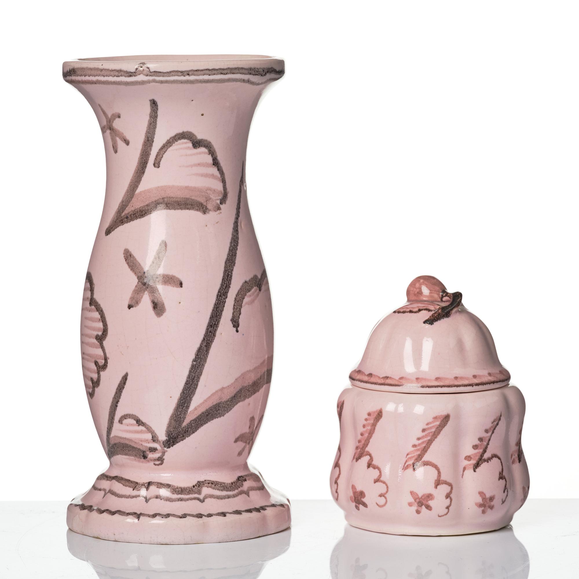 Wilhelm Kåge, Two earthenware vases, a lamp base and a jar with cover, Gustavsberg, Sweden, dated 1920.