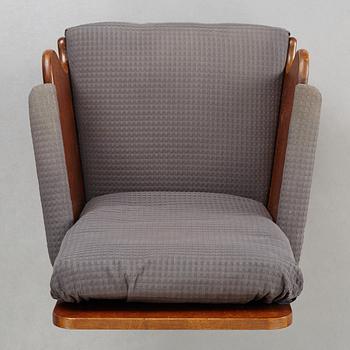 Carl Bergsten, a stained birch easy chair, Nordiska Kompaniet, Sweden 1918.