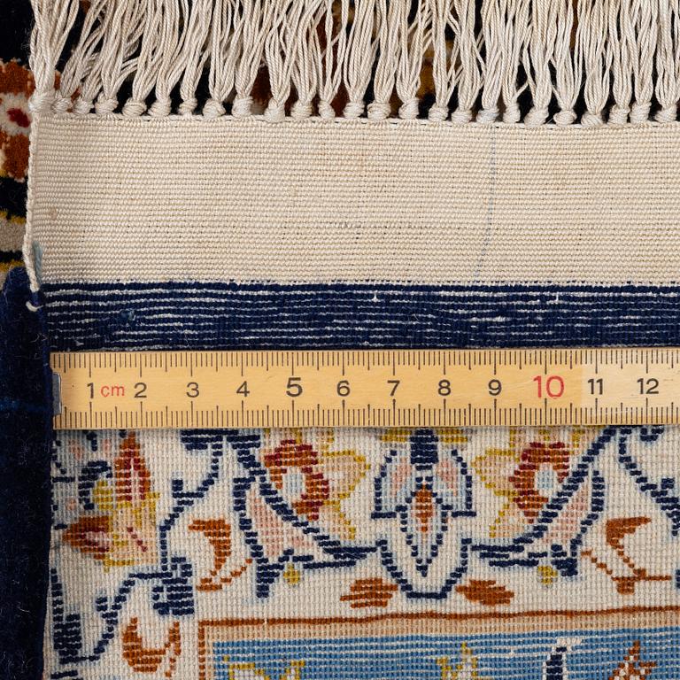 A semi-antique part silk Isfahan, signed, c. 176 x 107 cm.