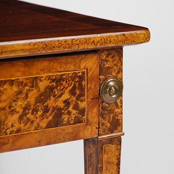 A Gustavian burr-parquetry and bilt brass-mounted table by A. Lundelius (master in Stockholm 1778-1823).
