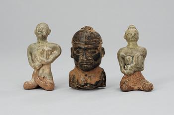 A set of three pottery figures, South America and Thailand.