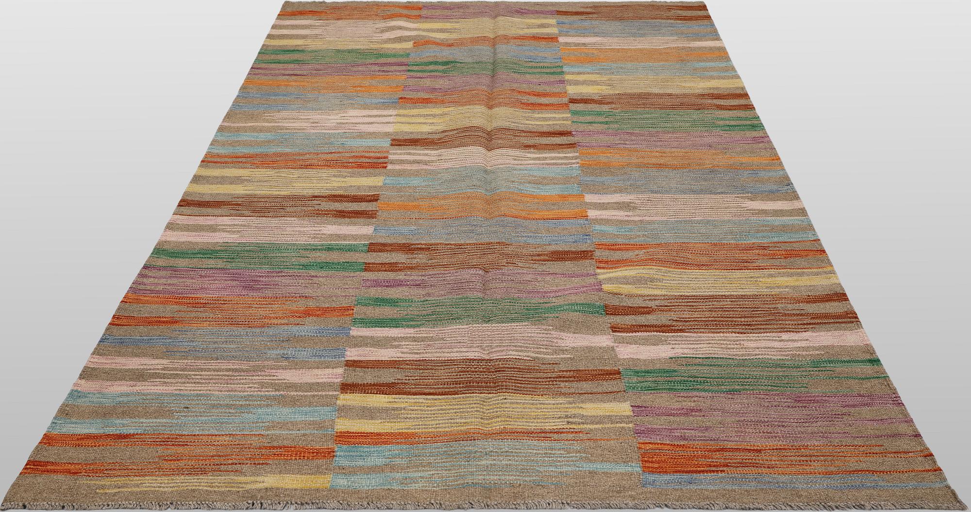 A Kelim carpet, c. 255 x 163 cm.
