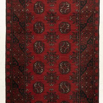 An oriental / Afghan runner, approx. 478 x 81 cm.