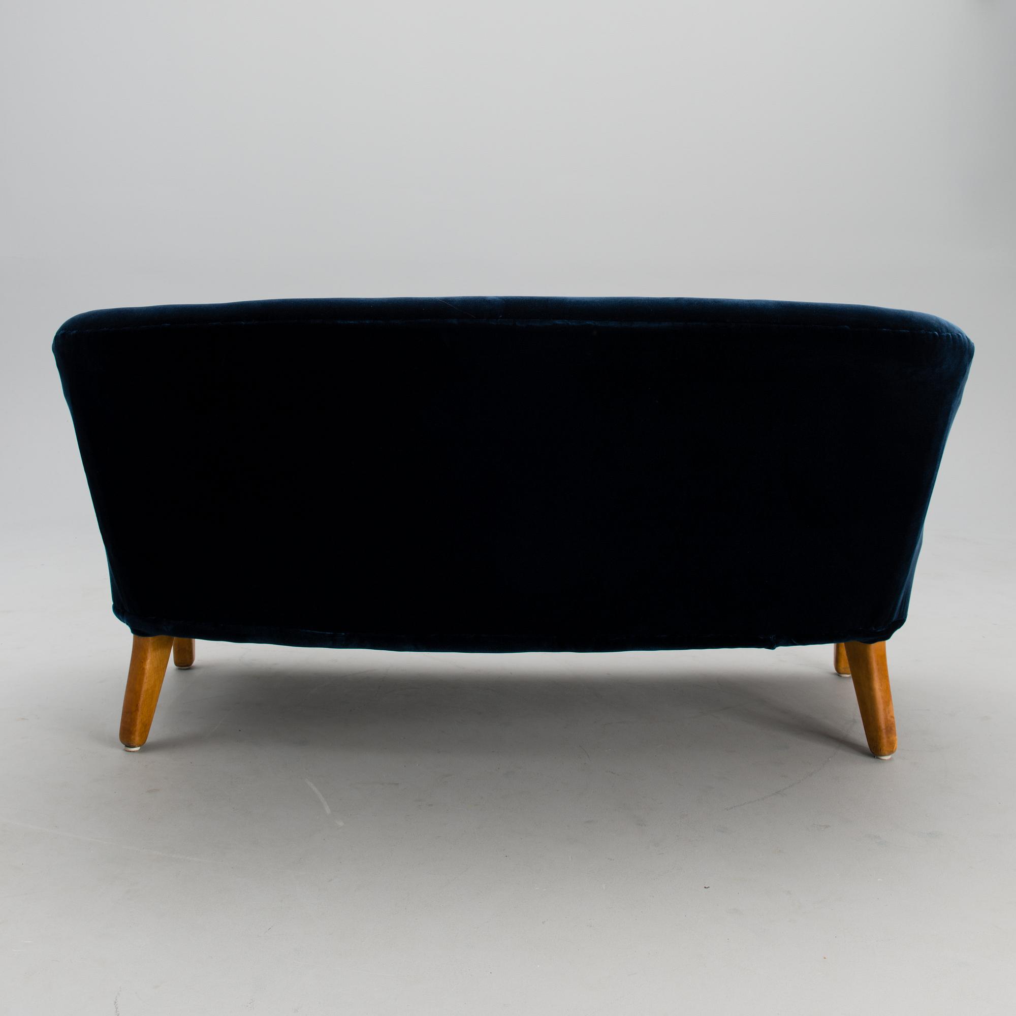 A sofa from the mid 20th century.