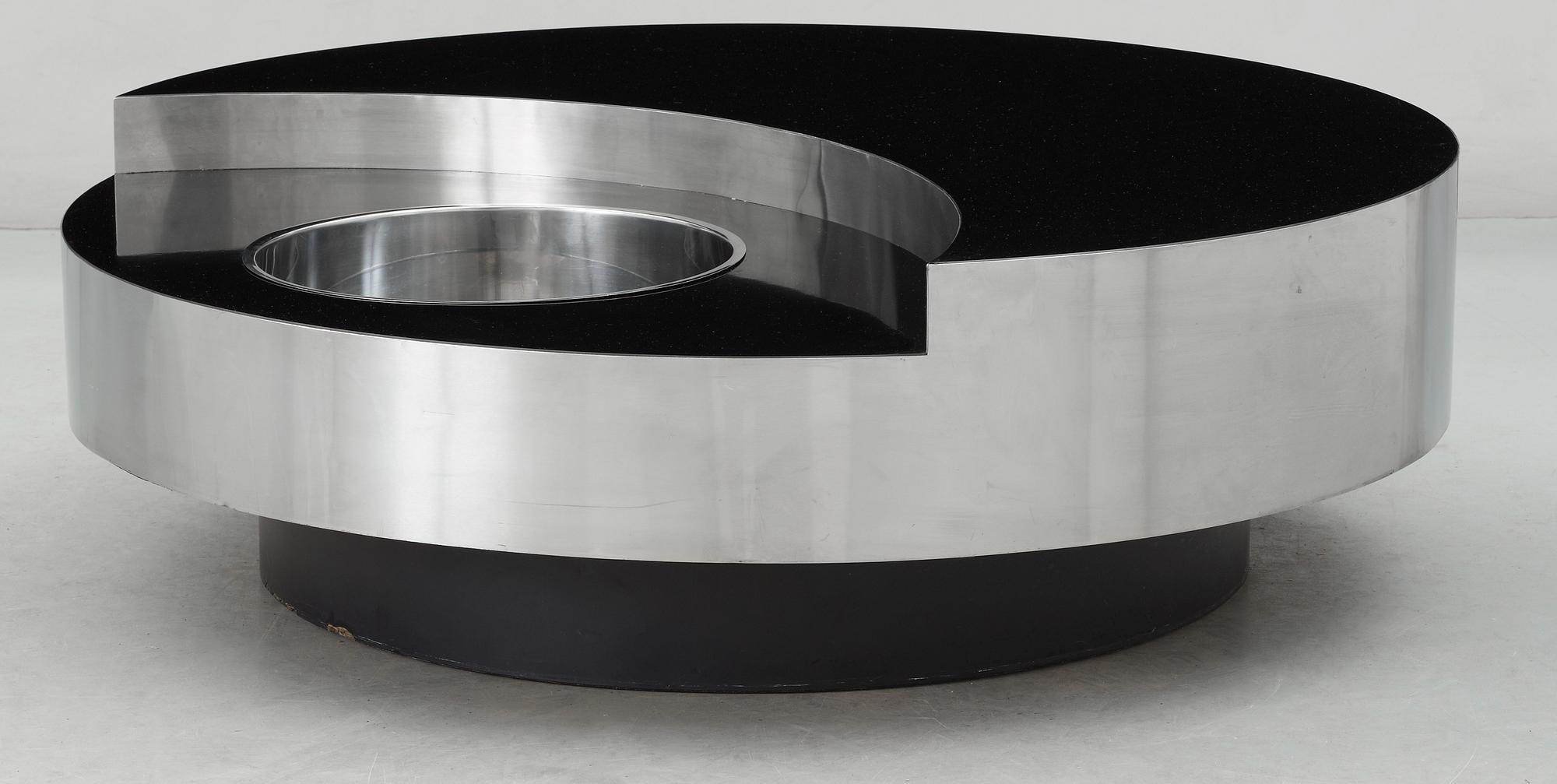 A Willy Rizzo revolving coffee table with bar, France, 1970s.