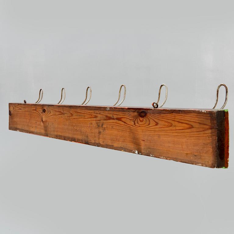 Hängare med krokar, 1900-talets början.