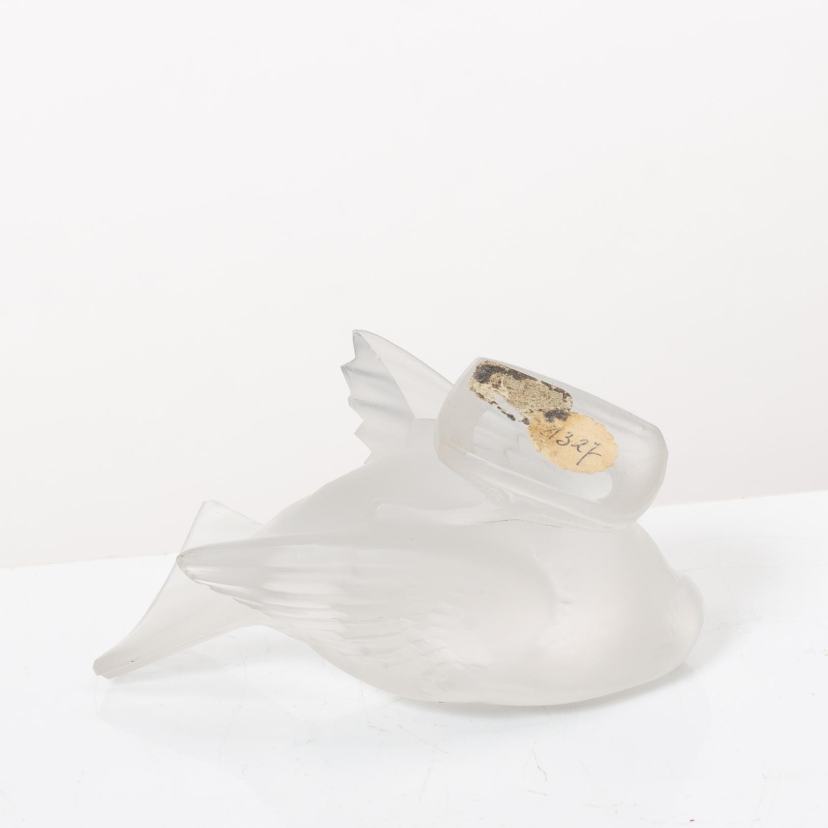 9 glass figurines, Lalique, France.