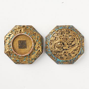 A bronze imitating seal paste box with cover, Qing dynasty, with Qianlong mark.