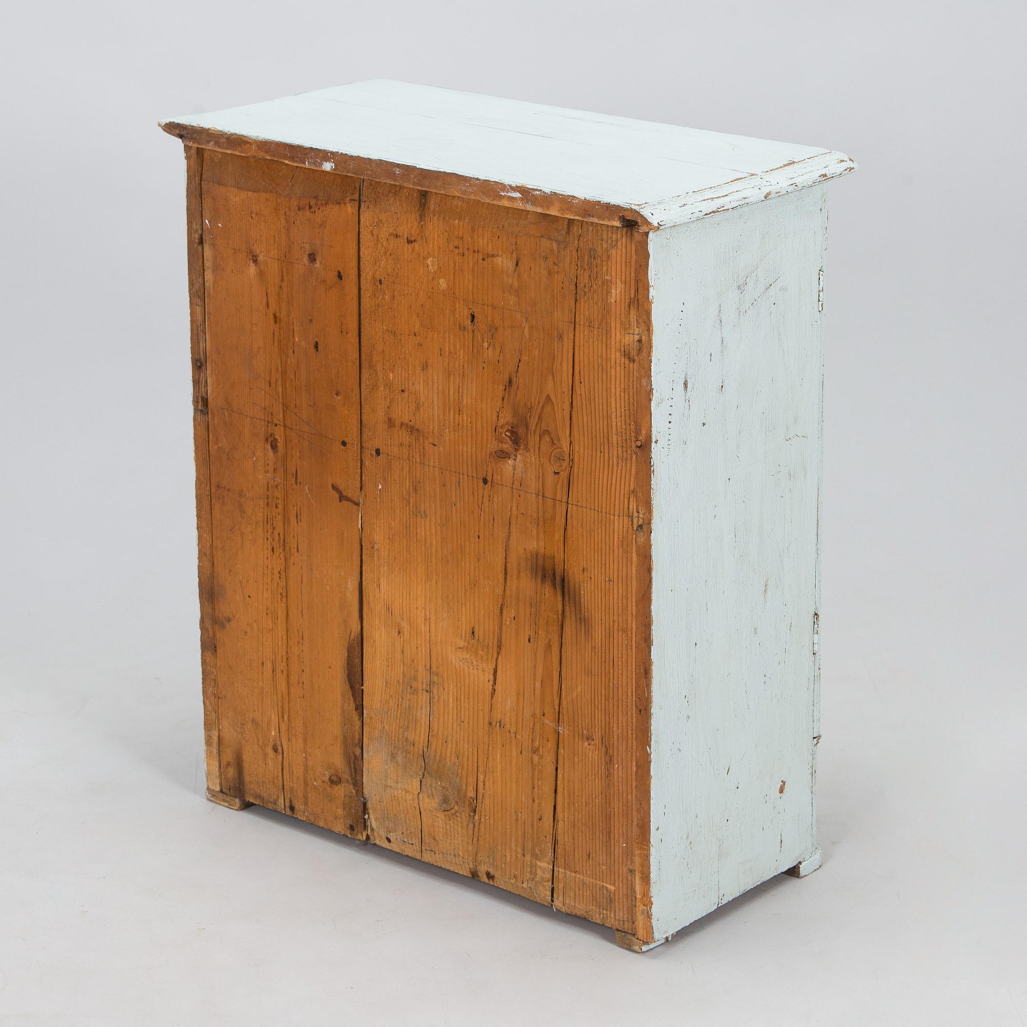 A painted cabinet, circa 1900.