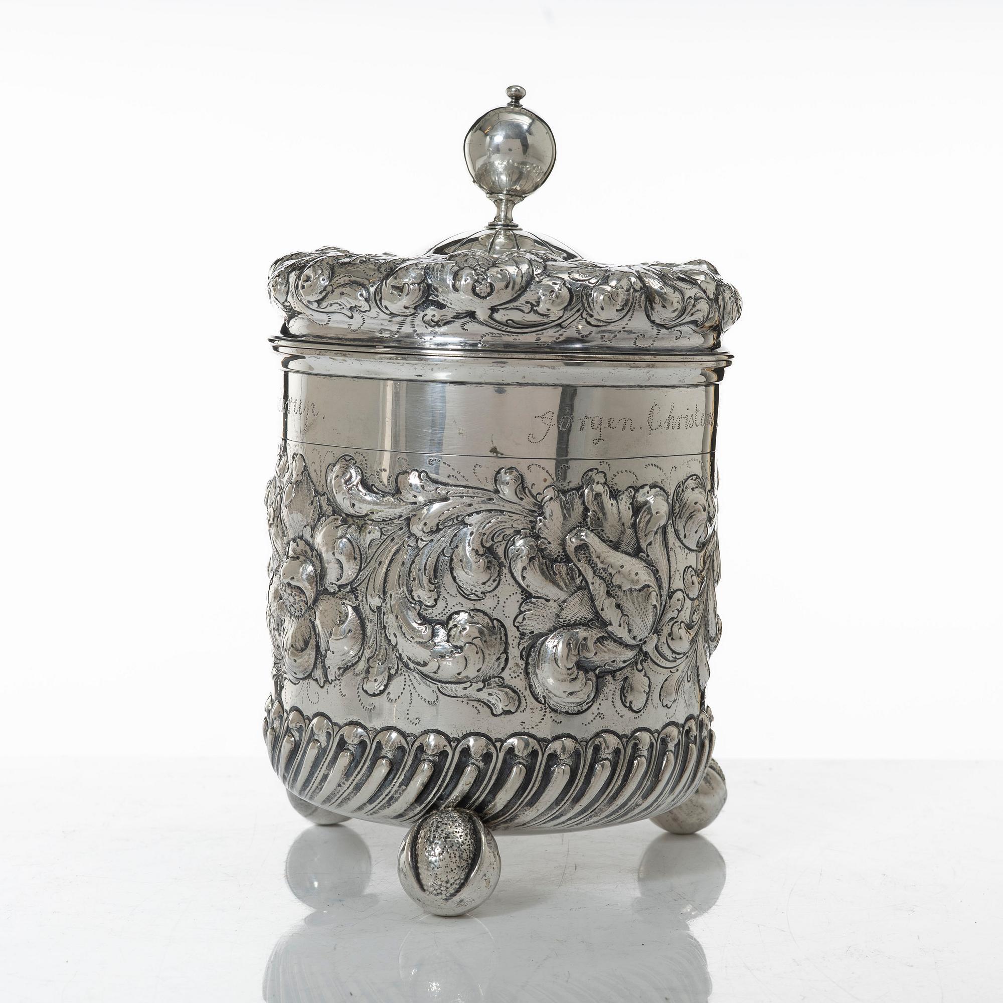 A 19th/20th century silver beaker and cover. Barock style.
