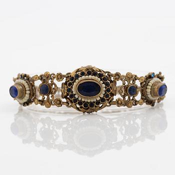 Bracelet, gilded silver with synthetic blue stones.