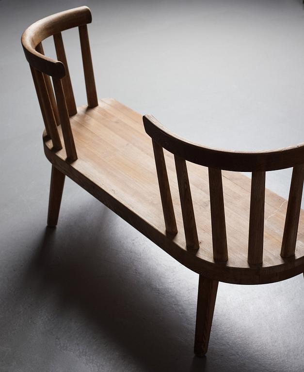 Axel Einar Hjorth, an "Utö" stained pine sofa, Nordiska Kompaniet, Sweden, 1930's.