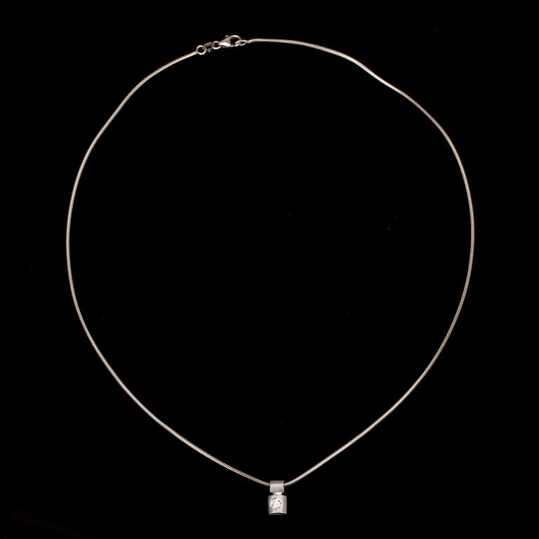 HÄNGE, briljantslipad diamant ca 0.20 ct. Uppskattningsvis H/vs. Platina. Keden 18K vitguld. Totalvikt 9,9 g.