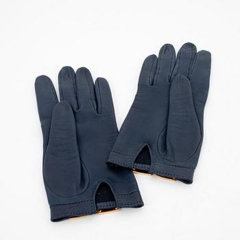 HERMÈS, a pair of blue leather gloves.