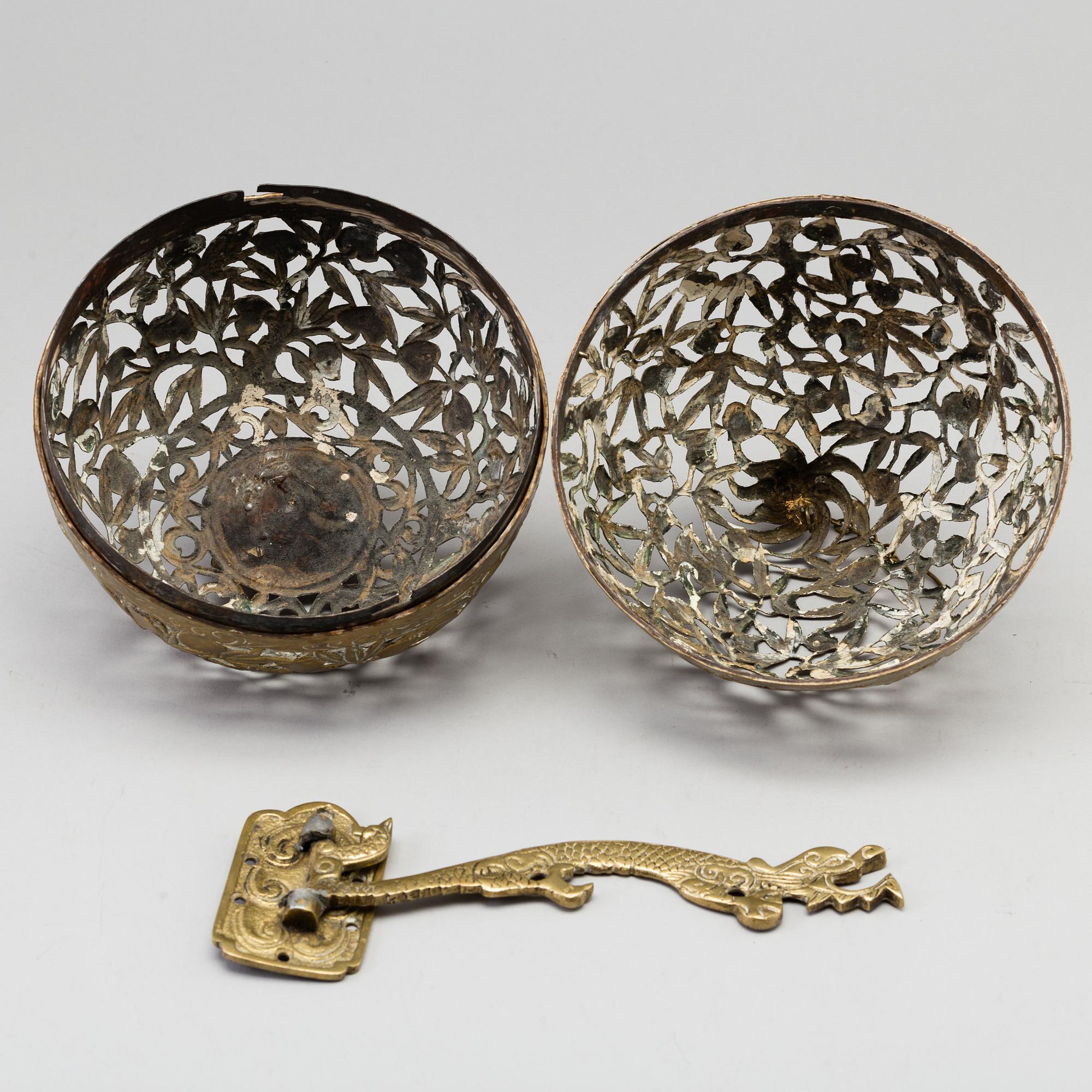 A Chinese bronze perfume ball, first half of the 20th century.