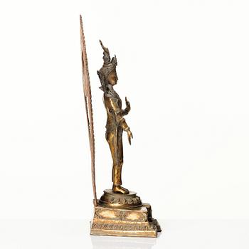 A gilt copper-alloy figure of Boddhisatva Avalokiteshvara, Nepal, 20th century.