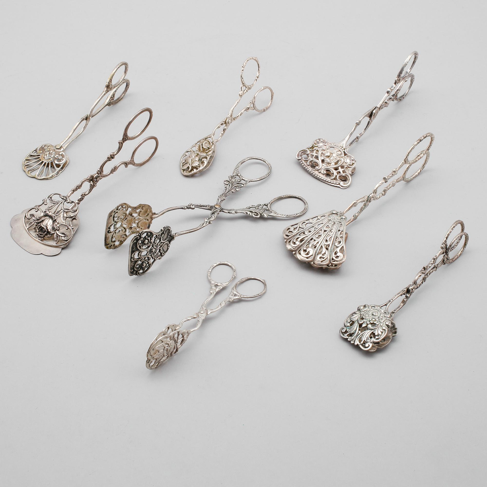 KAKTÄNGER, 8 st, silver, olika modeller, 1900-tal. Vikt ca 302 gram.