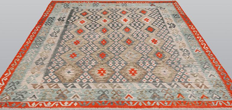 A Kilim carpet, ca 292 x 261 cm.